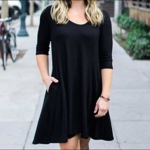 Black scoop neck dress with pockets